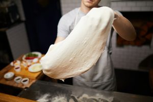 El Arte de Hacer Masa de Pizza